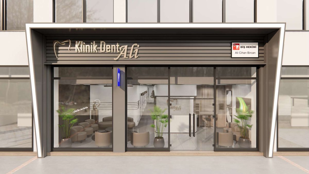 Kliniğin cephesi, giriş saçağı ve aydınlatmalı tabela