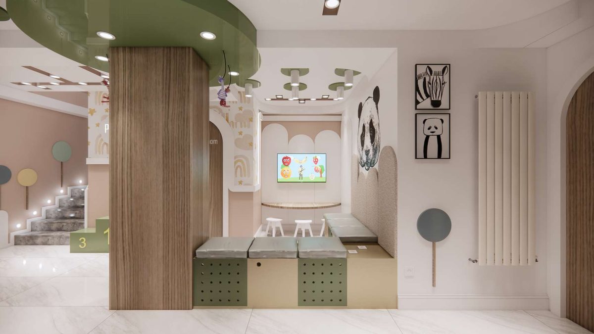 Treatment room in the children's department with low cabinets and a timber column